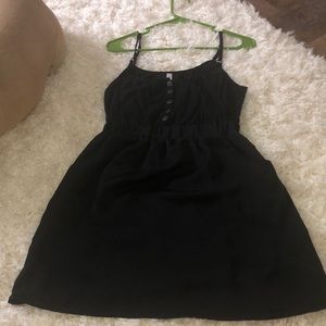 black sundress with silk material and buttons